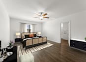 Thumbnail 22 of 35 - A bedroom with a bed, nightstand, and a dresser.