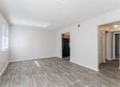 Thumbnail 6 of 17 - Apartments in Antioch, TN 37013 for Rent – Hickory Lake - A room with a wooden floor and white walls.