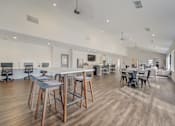 Thumbnail 14 of 19 - Resident kitchen and dining area at Hinton Heights Apartments in Cottage Grove, MN, designed for gatherings in a pet-friendly apartment community.