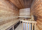 Thumbnail 10 of 19 - Wood-lined sauna at Hinton Heights Apartments in Cottage Grove, MN, offering residents a relaxing wellness amenity in a pet-friendly apartment community.