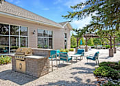 Thumbnail 11 of 19 - Hinton Height_Cottage Grove_MN_the preserve at patio with fire pit and chairs
