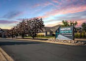 Thumbnail 19 of 19 - Hinton Height_Cottage Grove_MN_the sign at the entrance to the community under a colorful sky