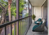 Thumbnail 7 of 23 - Horizons North Apartments near Aventura, FL photo of a balcony with two chairs and a table