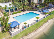 Thumbnail 9 of 23 - Horizons North Apartments near North Miami Beach Florida Photo Of aerial view of our resort-style pool