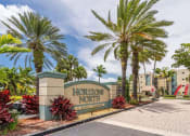 Thumbnail 23 of 23 - Horizons North Apartments in Miami Florida photo of a sign that says horizons north with palm trees in the background