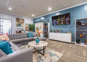 Thumbnail 15 of 23 - Horizons North Apartments near Aventura, FL photo of a clubhouse room with couches and a coffee table