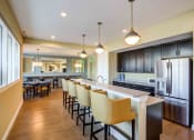 Thumbnail 13 of 19 - Kitchen area in clubhouse at Houston Street Manor