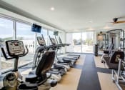 Thumbnail 8 of 19 - Houston Street Manor apartments in Jacksonville, FL photo of Fitness center- cardio machines, weighted machines
