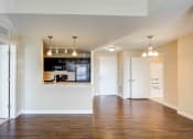 Thumbnail 3 of 19 - Houston Street Manor apartments in Jacksonville, FL photo of living room, dining room, and kitchen
