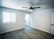 Thumbnail 28 of 31 - an empty room with a ceiling fan