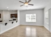 Thumbnail 9 of 26 - Harris Trail Luxury Townhomes for rent Richmond Hill, GA photo of living room with large window