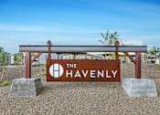 Thumbnail 47 of 47 - A sign that says "The Havenly" is in front of a building.