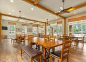 Thumbnail 24 of 24 - the reserve at bucklin hill clubhouse with large table and chairs