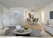 Thumbnail 9 of 42 - A living room with a white ceiling and a rug on the floor.