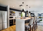 Thumbnail 13 of 20 - kitchen with breakfast bar