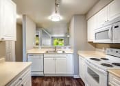 Thumbnail 8 of 30 - kitchen with wood-style flooring