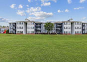 Thumbnail 24 of 25 - Apartment homes at Lancaster Place Apartments in Calera, Alabama surrounded by open green space in Shelby County near Birmingham.