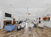 Thumbnail 20 of 25 - Spacious resident clubhouse at Lancaster Place Apartments in Calera, Alabama featuring comfortable seating, gathering spaces, and modern community amenities.