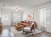 Thumbnail 14 of 63 - A living room with a brown couch, a coffee table, and a ceiling fan.