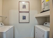 Thumbnail 21 of 33 - dryer and washer room in apartment