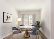 Thumbnail 29 of 63 - A modern dining room with a gold table and chairs.