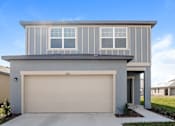 Thumbnail 12 of 75 - A modern house with a garage door and a driveway.