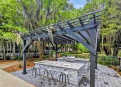 Thumbnail 5 of 11 - Marsh Cove Apartments in Savannah Georgia photo of bbq and picnic area