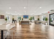 Thumbnail 11 of 14 - Pet-Friendly Townhomes in Burnsville, MN – Summit Townhomes - clubhouse with seating