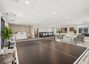 Thumbnail 12 of 14 - Townhomes In Burnsville, MN for Rent – Summit Townhomes - community room with a ping pong table