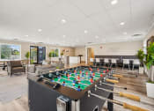 Thumbnail 4 of 14 - Burnsville, MN Townhomes – Summit Townhomes - clubhouse with foosball table