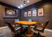 Thumbnail 18 of 22 - 1, 2 -Bedroom Apartments for Rent in North Little Rock, AR – Metropolitan– a meeting room with a table and chairs