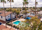 Thumbnail 27 of 37 - Apartments In Tucson, AZ 85716 for Rent – Midtown on Seneca – Photo of Swimming Pool Courtyard