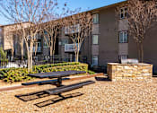 Thumbnail 22 of 24 - Mirador at Peachtree Apartments photo of picnic and BBQ grill area