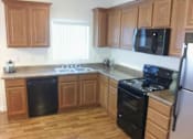 Thumbnail 20 of 22 - updated kitchen with black appliances