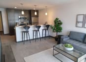 Thumbnail 23 of 50 - One bedroom living and bar area with stainless steel appliances