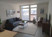 Thumbnail 24 of 50 - One Bedroom Living Room with floor to ceiling windows