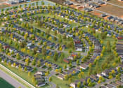 Thumbnail 22 of 22 - Luxury Homes In Foley, Alabama for Rent – Outpost Orchard Residential - an aerial view of a neighborhood with rows of houses and trees