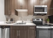 Thumbnail 2 of 36 - updated kitchen with stainless steel appliances