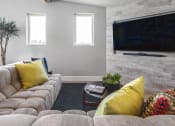 Thumbnail 19 of 36 - Penthouse lounge with table tennis, media center, fireplace, and gourmet entertainment kitchen