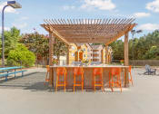 Thumbnail 10 of 16 - St. Ives Crossing apartments in Stockbridge Georgia photo of outdoor grill and seating area