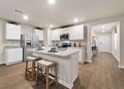 Thumbnail 2 of 30 - Gourmet Kitchen With Island at The Village at Hickory Street, Foley, AL