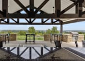 Thumbnail 17 of 25 - Covered patio with views at Georgetown TX apartments near Round Rock