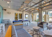 Thumbnail 15 of 25 - Indoor-outdoor clubhouse at luxury apartments near Austin in Georgetown TX
