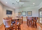 Thumbnail 14 of 20 - Pet-Friendly Apartments in Beaumont, TX – Breakwater Bay - business center with tables