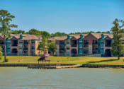 Thumbnail 21 of 24 - Outside view of Lake forest from the water with the apartments