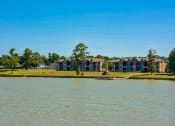 Thumbnail 16 of 24 - Outside view of Lake forest from the water with the apartments