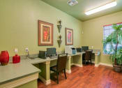 Thumbnail 10 of 24 - Business center with computers and chairs