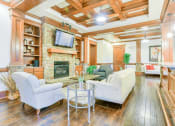Thumbnail 12 of 23 - clubhouse lounge area with flat screen tv and couches