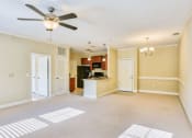 Thumbnail 6 of 23 - living room view of the kitchen and entrance of the lofts at reynolds village