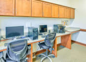 Thumbnail 14 of 23 - business center with two computers and two chairs